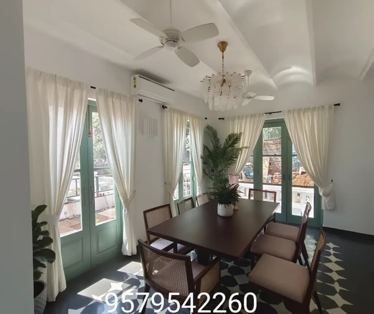 Dining Room With Sheer Curtains