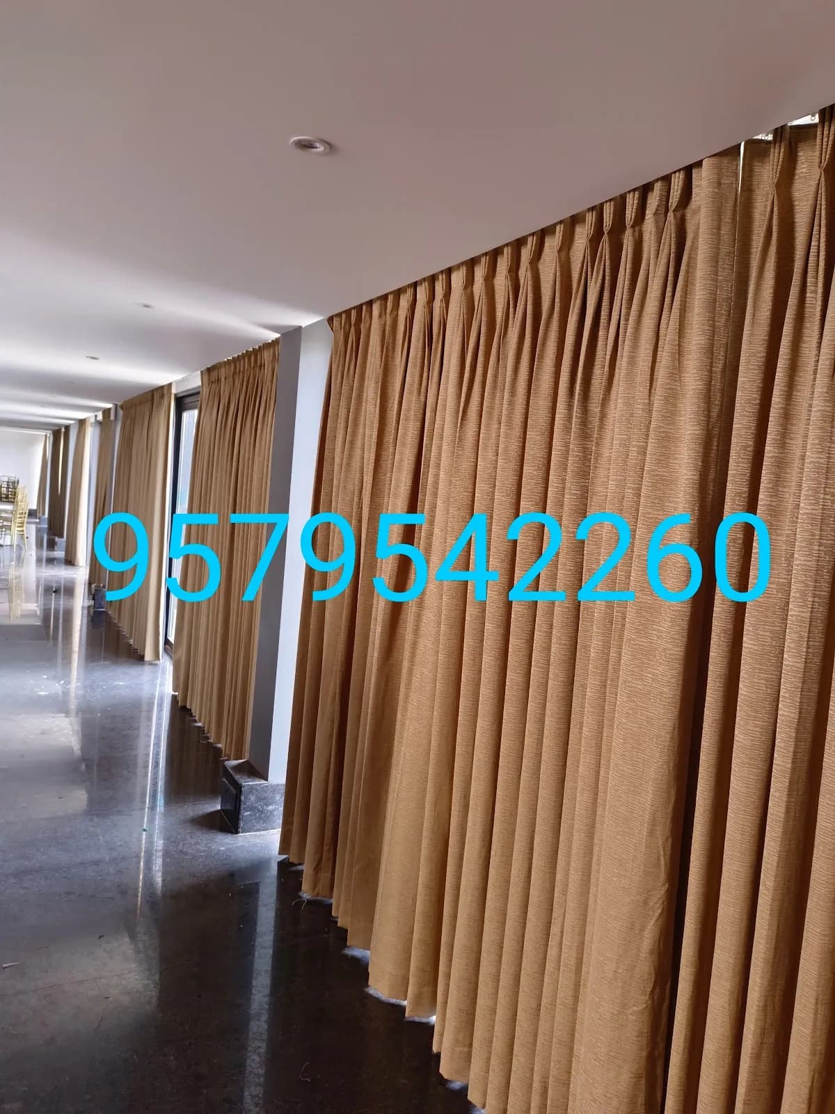 Long Brown Pleated Wall Curtains for a Vasco residence