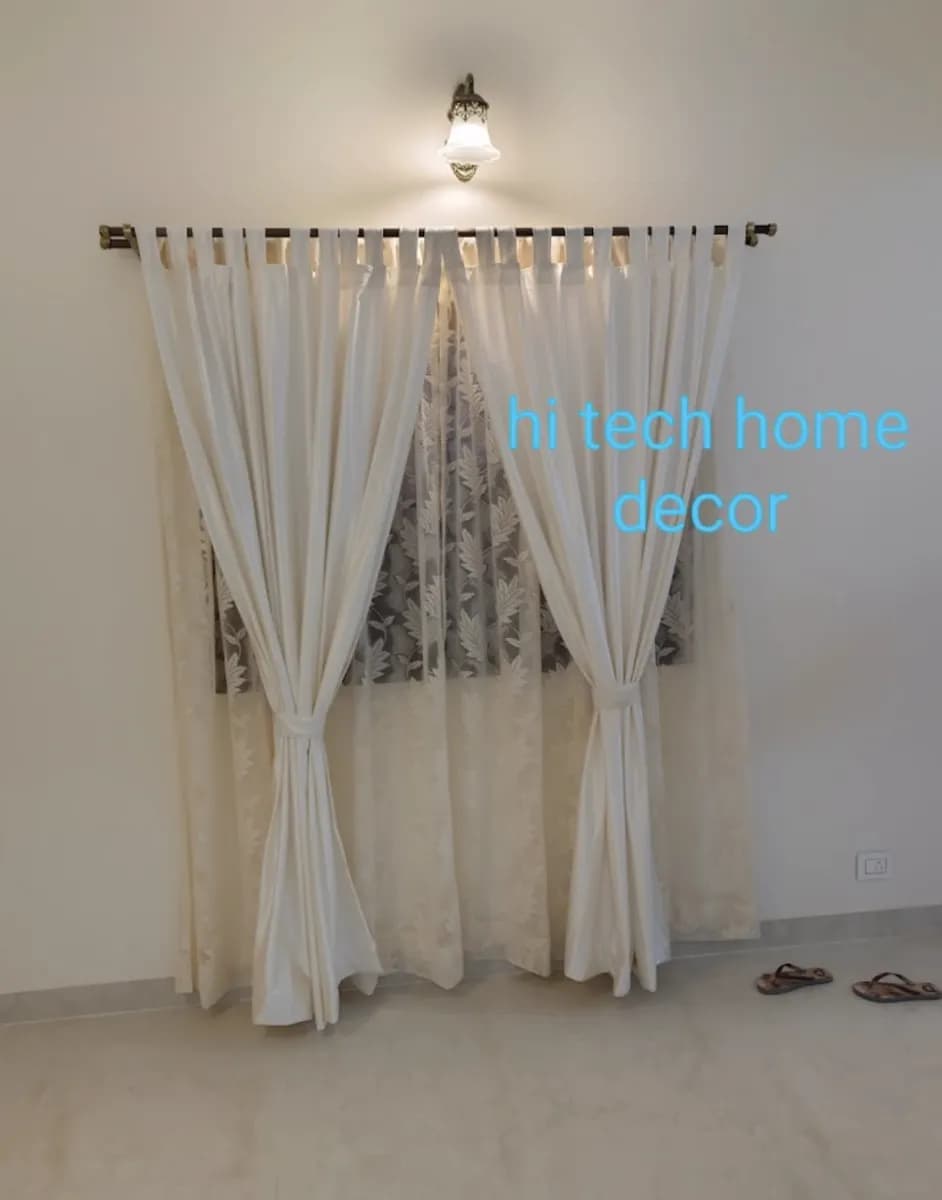 Cream Curtains Tied Back with Sheers for a Vasco residence
