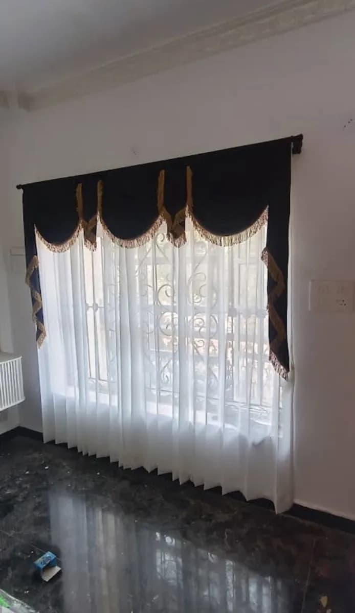 Royal Black Valance over Sheer Curtains for a Vasco residence