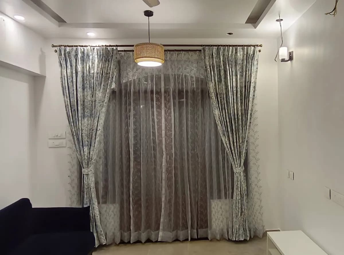 Floral Drapes with Sheer Curtains for a Vasco residence