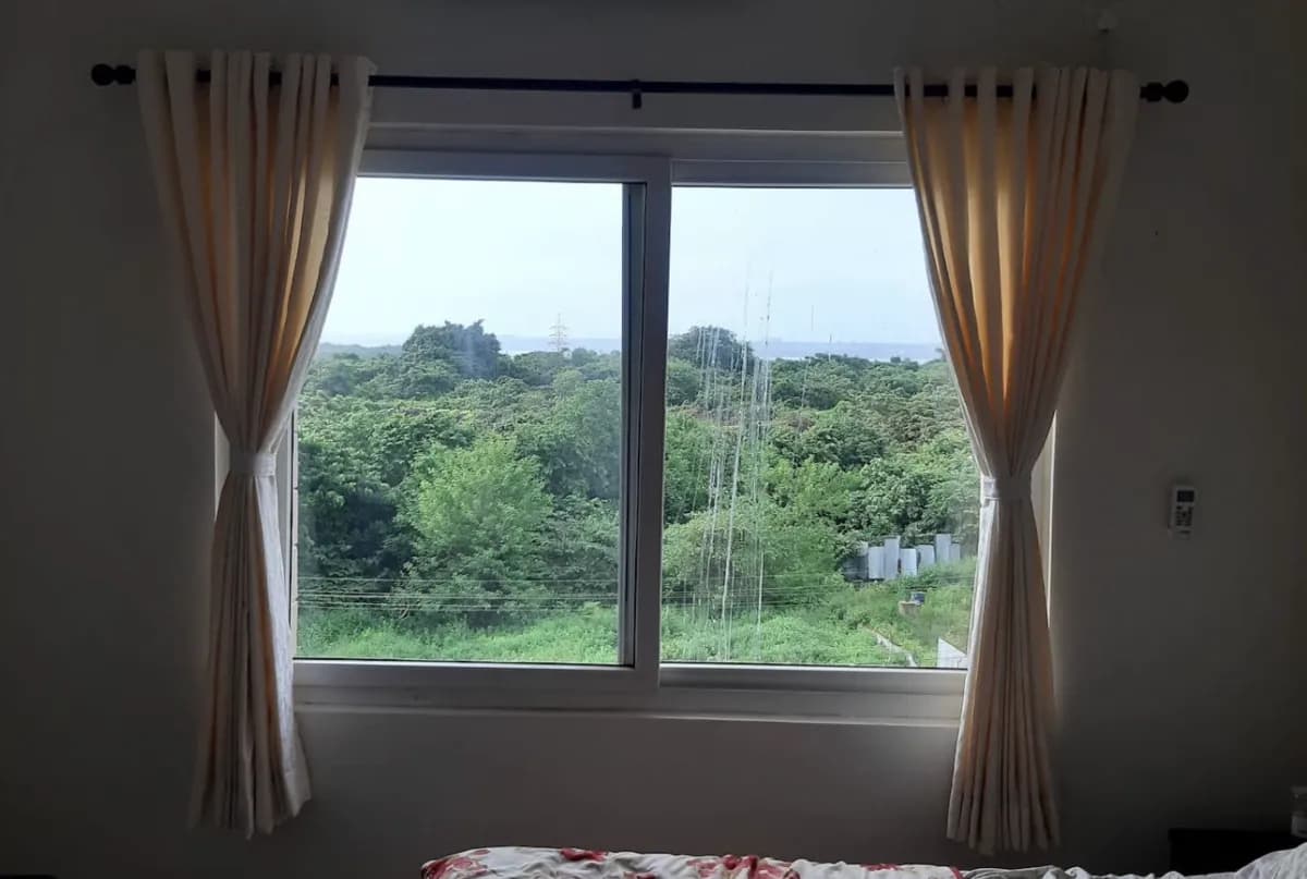 Solid Cream Pinch Pleat Curtains for a Vasco residence