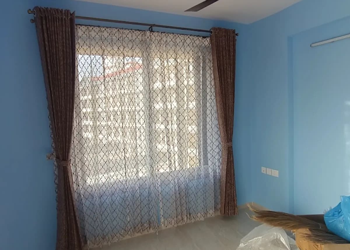 Sheer Patterned Pinch Pleat Curtains for a Vasco residence