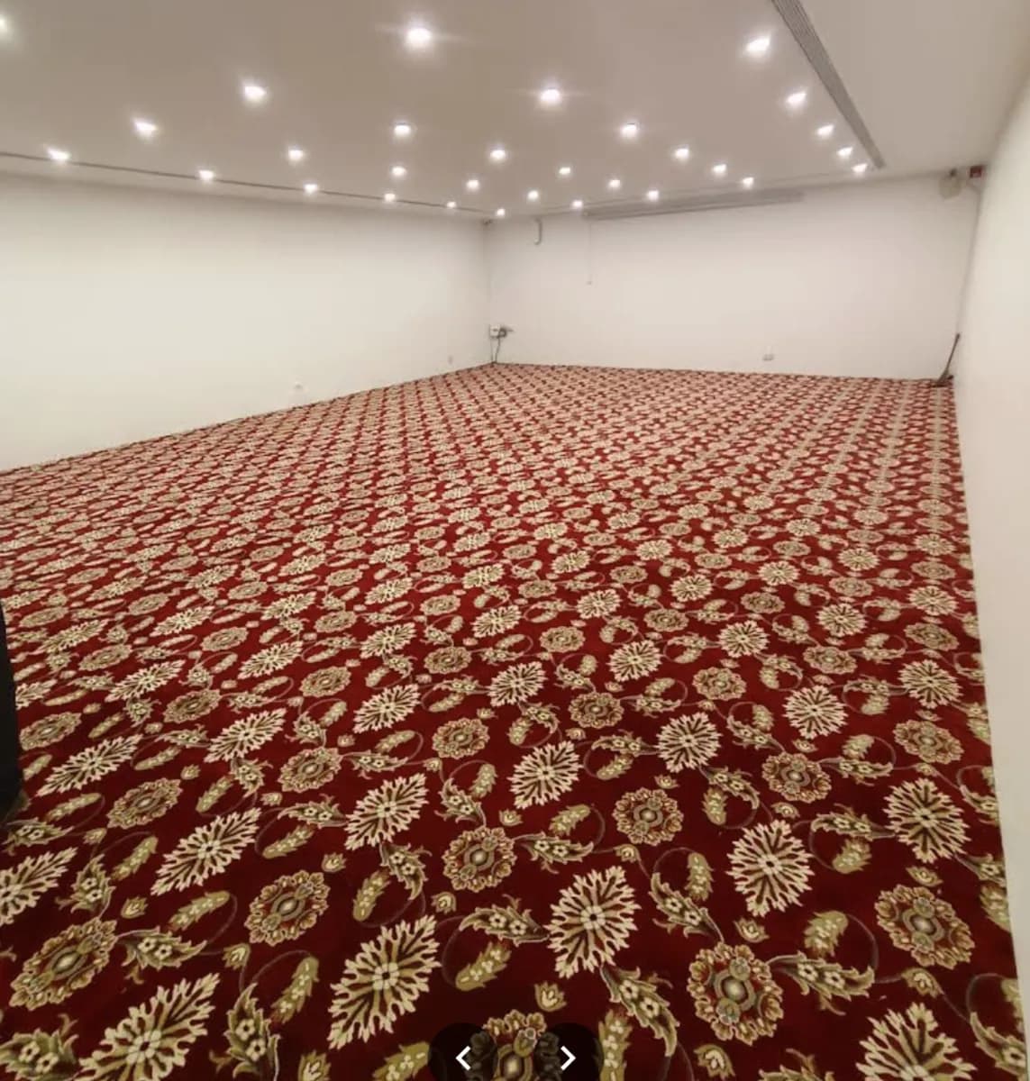 Large Red Floral Event Carpet for a Vasco residence