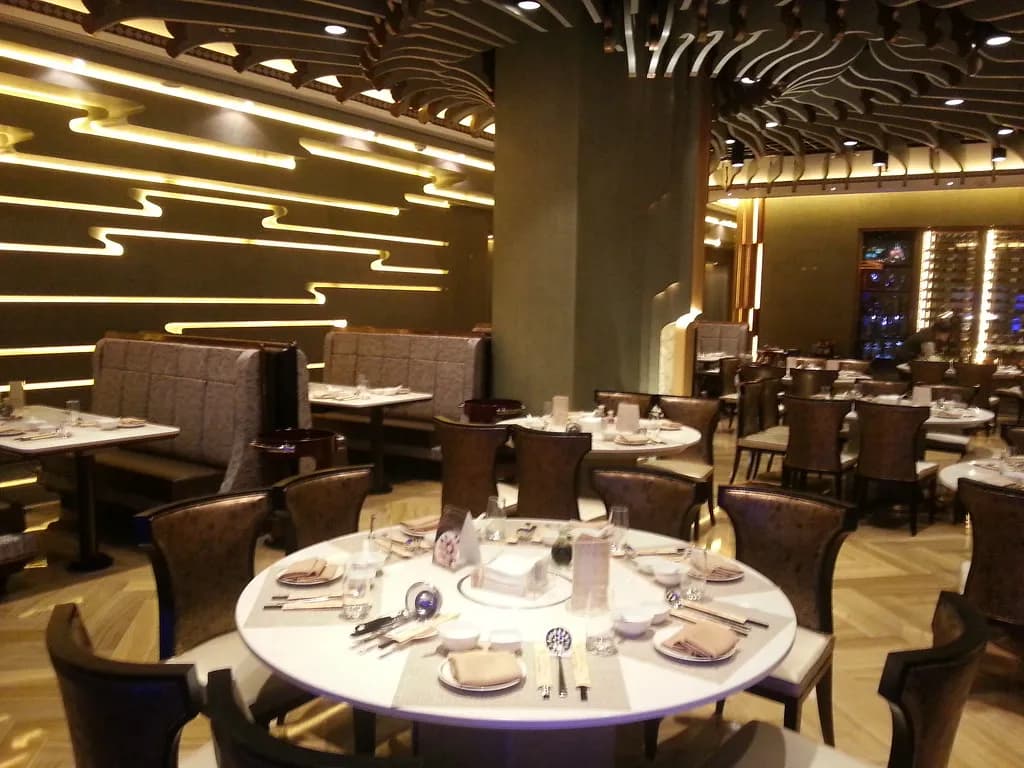 Restaurant with upholstered booth seating along the wall