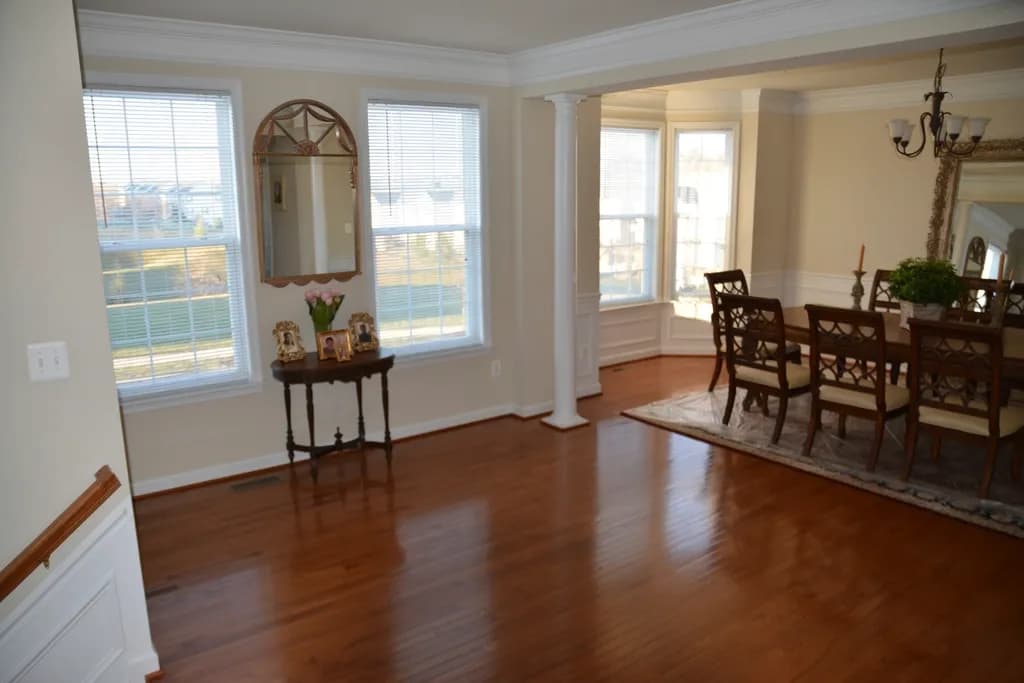 Dining room with a polished wooden floor