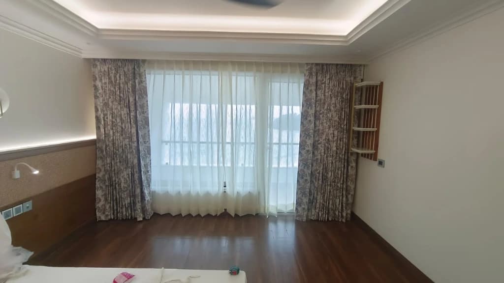 Smart motorized curtains in sea-facing suite at Bogmalo Beach Resort Goa