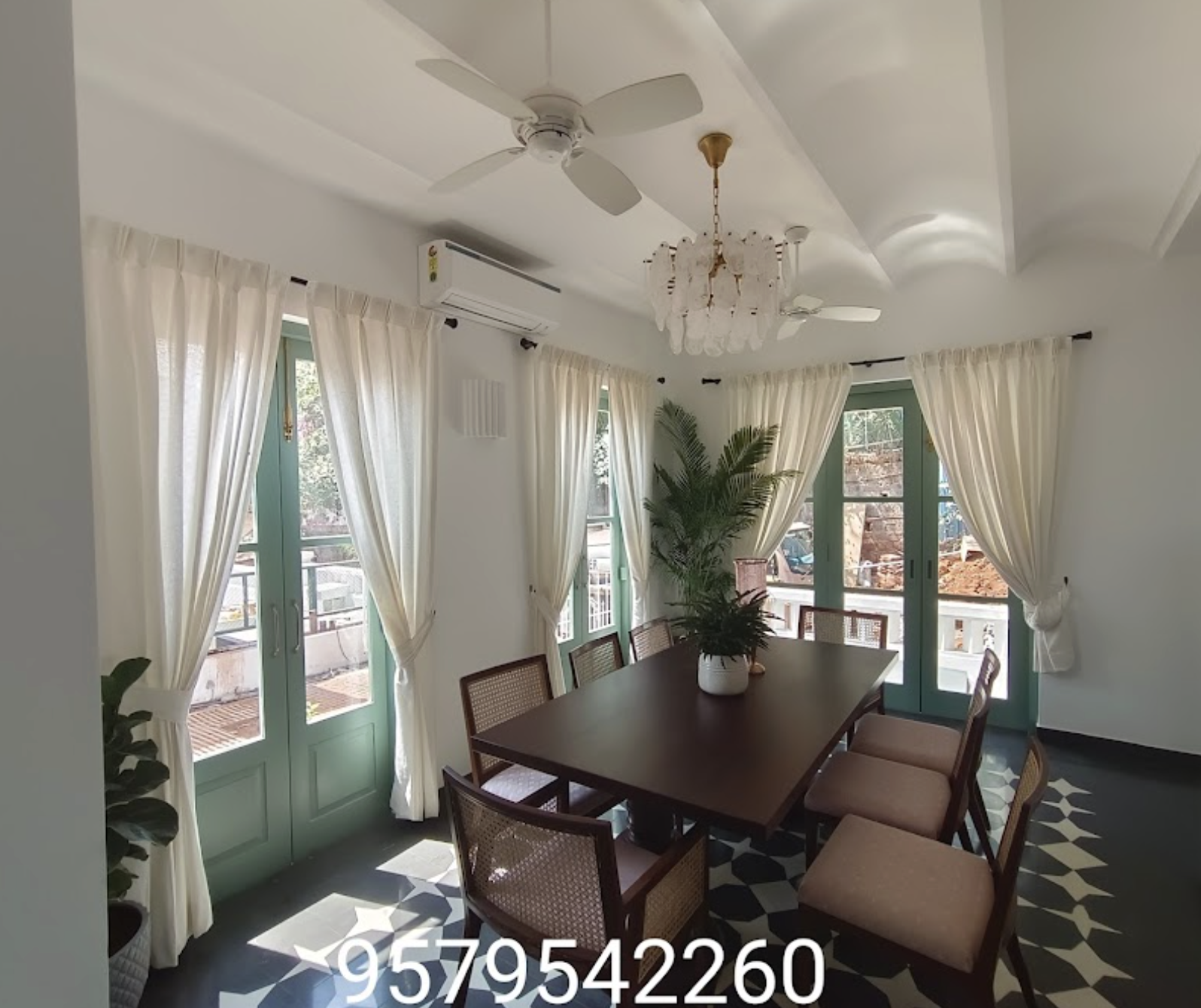 Dining Room With Sheer Curtains