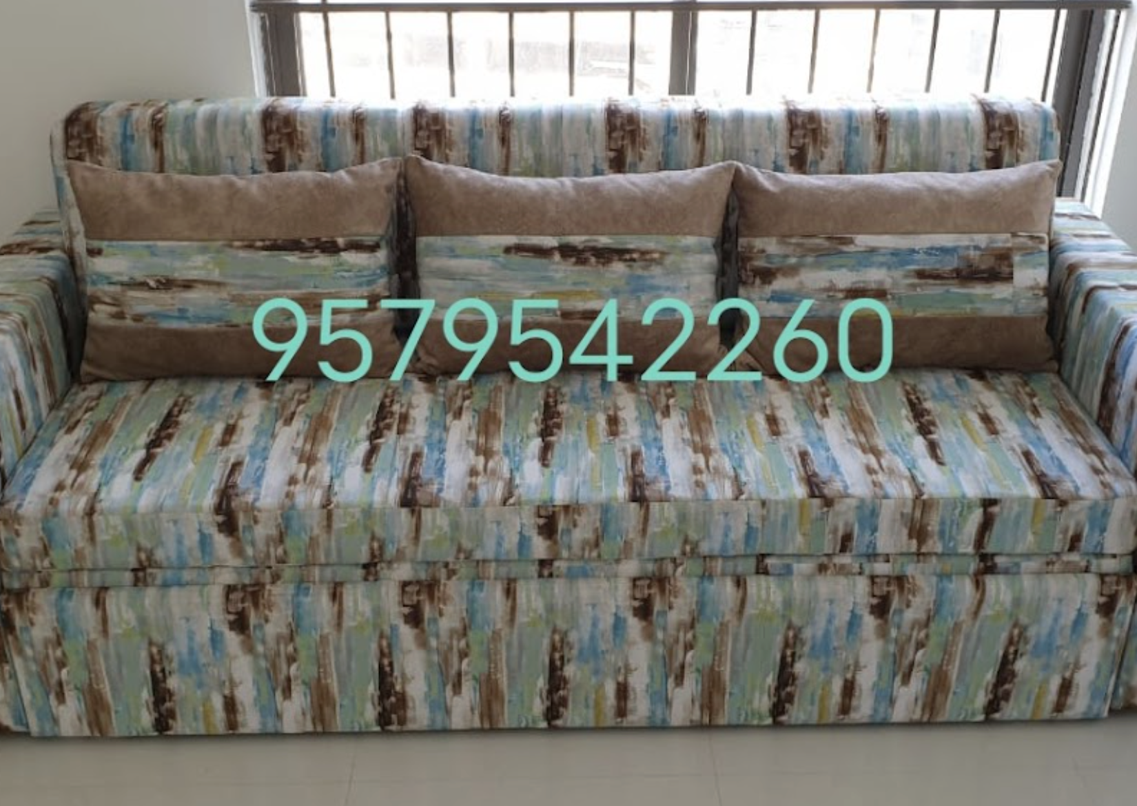 Multicolour Printed Sofa Bed